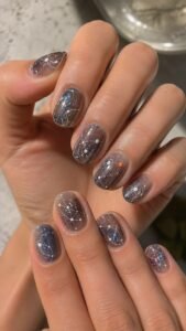 Bubble Chamber Nails With Curved Particle Trails